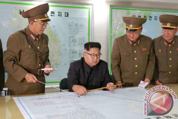 Pimpin Rapat Perang, Kim Jong-un: Jika Ingin Hentikan Rudal Ini Maka Cobalah 