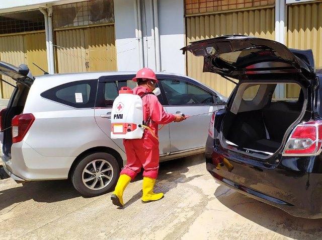 Gerakan KitaVSCorona, Grab Semprot Disinfektan Kendaraan Mitra