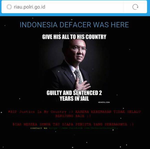Situs Polda Riau Berubah Jadi Foto Ahok, Ada Apa?