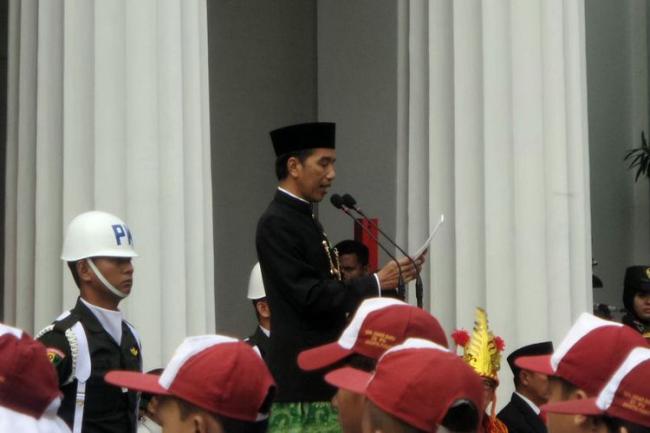  Jokowi Minta Industri Angkutan Online Diawasi dan Diatur