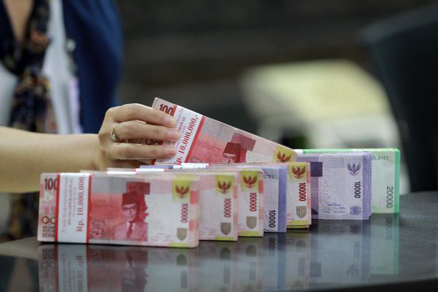 AS Buka Lockdown, Rupiah Unjuk Gigi ke Rp15.385 per Dolar AS 