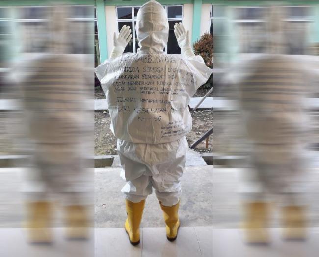 Sebait Doa di Baju Hazmat