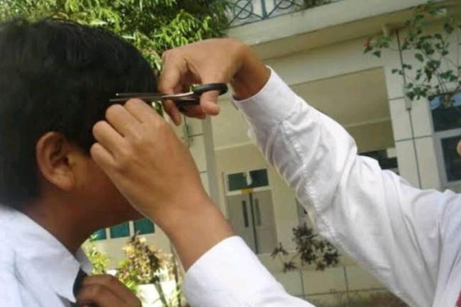 Paksa Potong Rambut Siswa, Seorang Guru Terancam Penjara