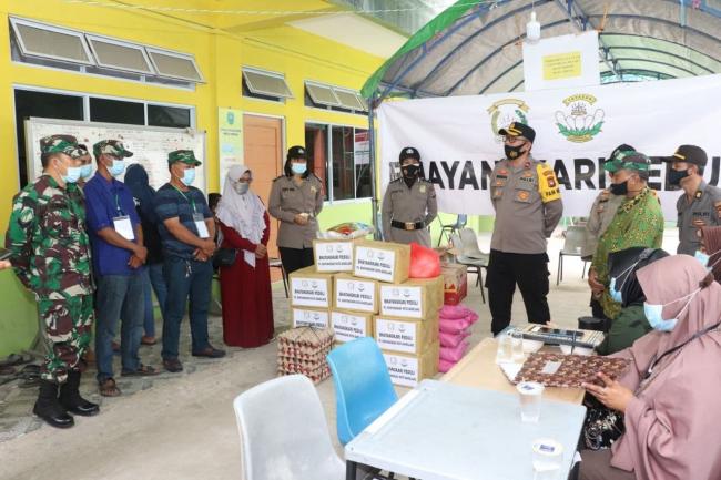 Korban Longsor di Batu Merah Dapat Bantuan Sembako Bhayangkari Peduli
