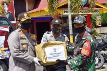 Distribusi Sembako di Tanjungpinang Libatkan Bhabinkamtibmas dan Babinsa