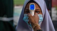 Saat Angka Kasus Corona Malaysia Kini Lampaui China