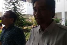 Wajah Tegang Kadis PUPRP Kepri Abu Bakar Kala Diperiksa Penyidik KPK