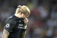 Pendukung  ke Kiper Liverpool: Saya akan Membunuh Anak Perempuanmu
