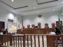 Kecanduan Judi Online, Kepala Kantor Pos Midai Natuna Nekat Korupsi