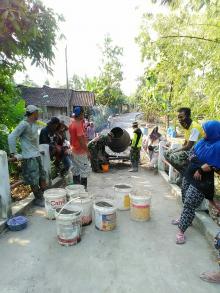 Kebersamaan Dalam  Menyelesaikan  Program TMMD