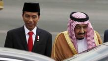 Hujan Deras Tak Surutkan Ribuan Warga Bogor Sambut Raja Arab