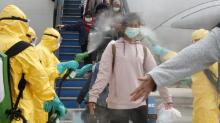 Kontroversi Semprotan Disinfektan Saat WNI dari China Tiba di Karantina