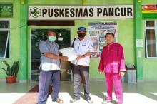 Pandemi Corona, Sui Hiok Bagi APD ke Sejumlah Puskesmas di Lingga