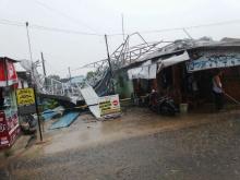 Tornado Raging Tears Down Roofs of Buildings