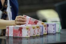 AS Buka Lockdown, Rupiah Unjuk Gigi ke Rp15.385 per Dolar AS 