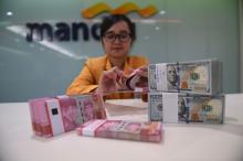 Dolar AS Mulai Dekati Rp 14.000