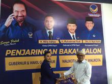 Yuhendri Kembalikan Berkas Formulir Pendaftaran ke Nasdem dan Golkar 