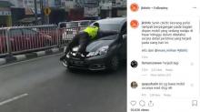 Terjadi Lagi, Polisi Nyangkut di Kap Mobil yang Diberhentikan