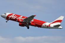 Pilot Wanita AirAsia Pakai Hijab Eksklusif