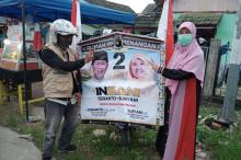 Warga Ini Punya Cara Unik Kampanyekan Isdianto-Suryani