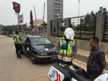 [Jurnalisme Warga] Polantas Razia Taksi Plat Hitam. Ini Alasannya