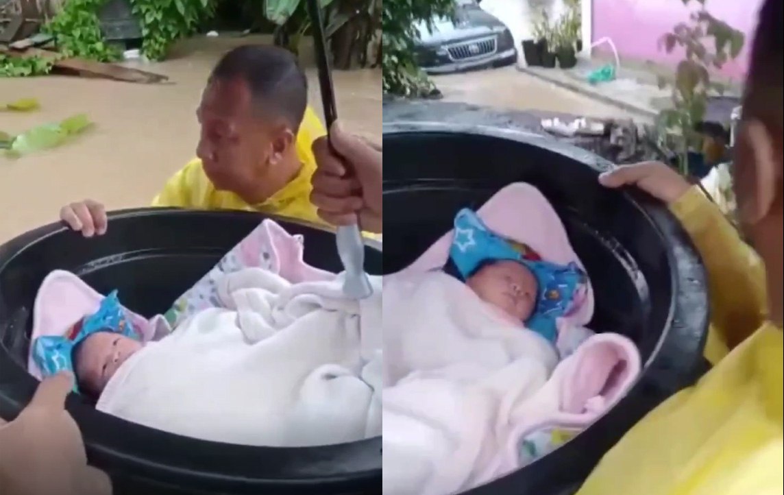 Video Menegangkan Evakuasi Bayi Pakai Ember Terjebak Banjir di Natuna