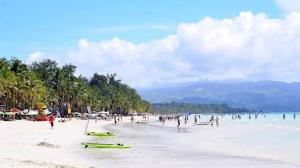 Tips Berwisata ke Pantai saat Cuaca Panas Terik