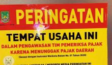 Bapenda Batam Tindak Restoran Penunggak Pajak di Grand Mall, Pasang Stiker Peringatan