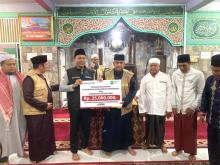 BRK Syariah Serahkan Bantuan Rp 25 Juta pada GSSB ke-172 di Masjid Ubudiyah Pasar Danau Bingkuang