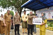 Dorong Digitalisasi Pelaku UMKM di Kepri, BRK Syariah Serahkan Layanan QRIS dan Subsidi Margin 