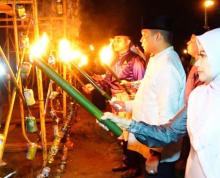 Pj Walikota Pekanbaru Buka Festival Lampu Colok: Melestarikan Budaya Melayu di Kecamatan Bukit Raya