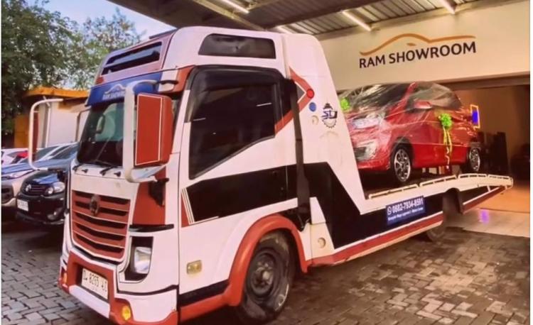 Inovasi Baru! RAM Showroom Hadirkan Layanan Antar Mobil Bekas Dengan Truck Towing