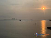 Libur Natal di Teluk Terih, Nikmati Sunset dan Seafood Segar Meski Hujan