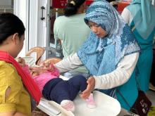 Peringati Hari Gizi Nasional, Alfamart Gelar Posyandu di 35 Kabupaten/Kota