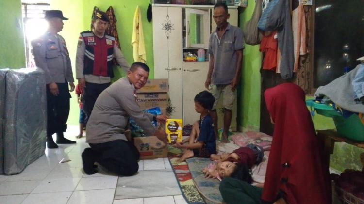 Polsek Nongsa Gelar Baksos HUT Bhayangkara ke-79, Bantu Anak Penderita Gizi Buruk di Batu Besar