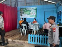 Polsek Senayang Amankan Kegiatan Pengobatan Gratis TIME di Tajur Biru, Puluhan Jemaat Antusias Ikuti Layanan Kesehatan